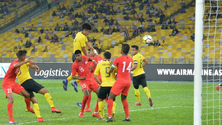 Laga ujicoba Malaysia vs Singapura (1-2) di Stadion NAsional Singapura, Sabtu (26/03/22). Dok. Indosport