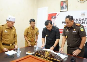 Bupati Sutan Riska Teken MoU Bidang Perdata dan TUN dengan Kajari Dharmasraya