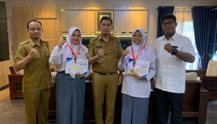 Harumkan Nama Sumatera Barat, Dua Siswi Sawahlunto Raih Juara 1 Kejurnas Bridge Pelajar ke-58 Solo