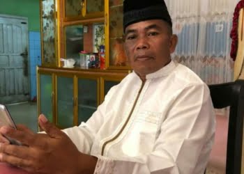 Kepala SMPN 1 Air Haji Kecamatan Linggo Sari Baganti, Afrizal, SPd