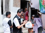 BRI RO Padang Bagi-bagi Seribu Paket Sembako untuk Warga Alai Parak Kopi