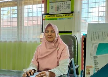 Kepala SMPN 4 Painan Kabupaten Pesisir Selatan, Ermawati, SPd