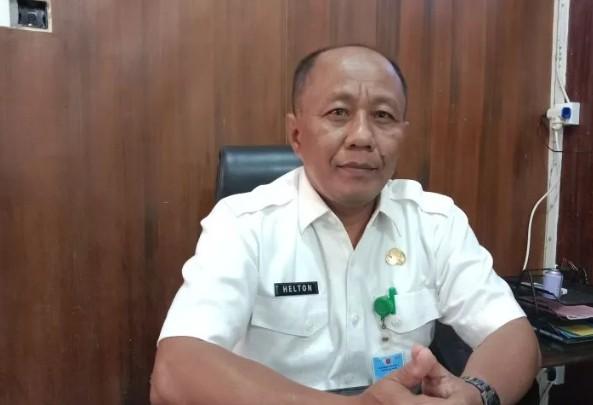 Kepala Dinas Kependudukan dan Pencatatan Sipil Agam Helton.
