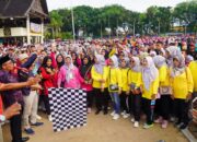 HUT PGRI Ke-78 dan HGN, Puluhan Ribu Peserta dari Kota Padang  Ikuti Jalan Santai