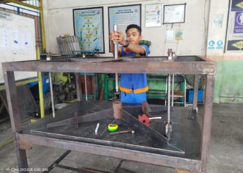 SMK Semen Padang Produksi Mesin Press Restorasi untuk Arsip