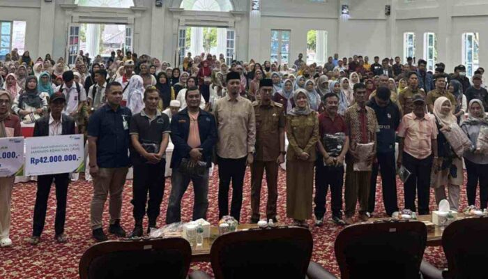 BPJS Ketenagakerjaan Bukittinggi Serahkan Santunan JKM kepada Ahli Waris RT/RW