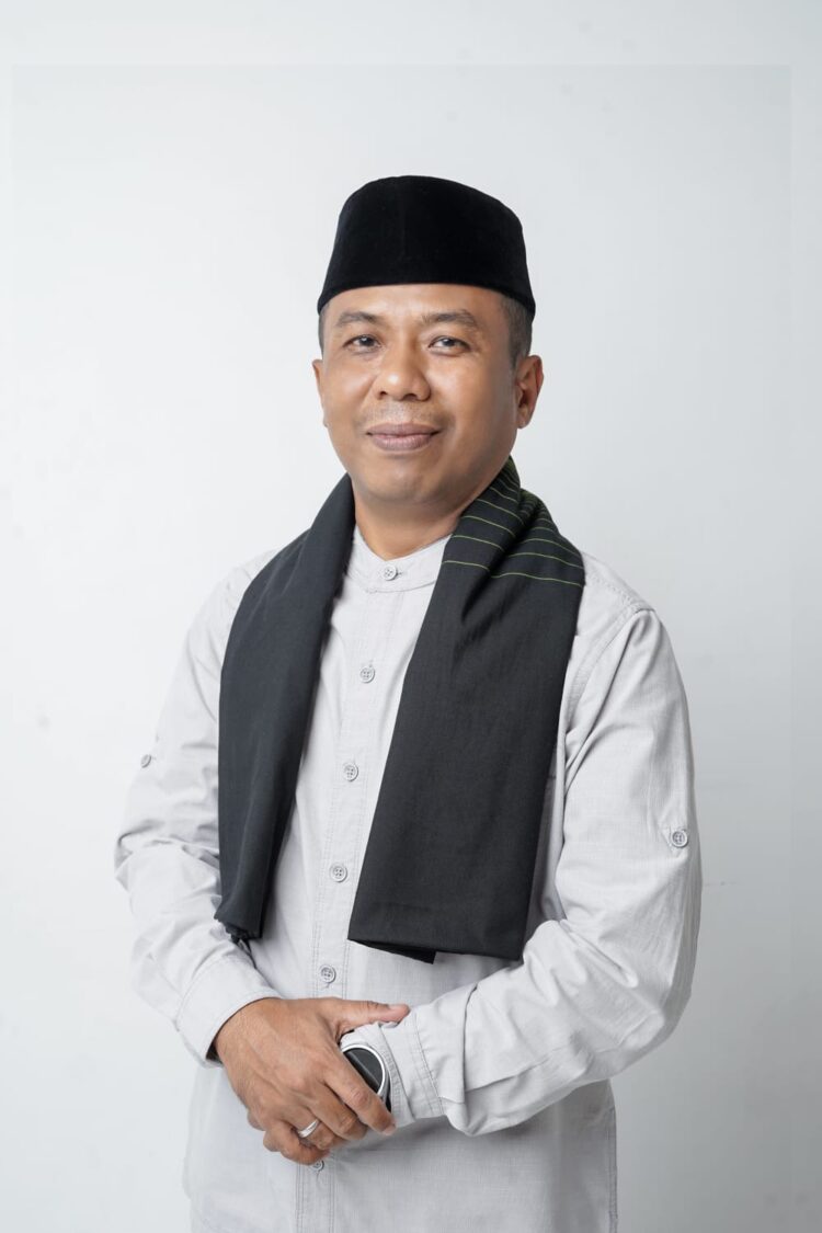 Isrizal, M.Pd (Kepala MTsN 1 Kota Padang)
