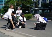 Telkom Gelar Aksi Jalan Santai Sambil Pilah Sampah Plastik dalam Rangkaian GoZero% Goes to Medan