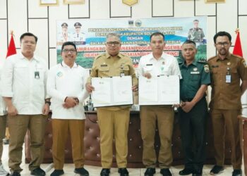 Penandatanganan Perjanjian Hibah Daerah Pemkab Solok Selatan bersama Balai Besar Taman Nasional Kerinci Seblat (BBTNKS) yang berlangsung di Aula Tansi Ampek, Senin (23/6/2025).IST