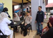 Senyum Sehat di Tengah Pasar: Aksi Humanis Polres Solok Selatan Sambut HUT Bhayangkara ke-79”