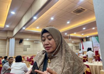 Nasabah Pegadaian Syariah Cabang Ujung Gurun, Yanti (47) yang merasakan manfaat cicilan emas pegadaian. YESI