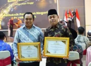 Pemkab Dharmasraya Raih Penghargaan Predikat Kabupaten Informatif dari KI Sumbar