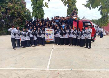 Peringati HUT PGRI ke-80, OSIS SMPN 3 Sungai Rumbai Gelar Pawai Spesial untuk Guru