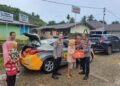 Polsek Koto XI Tarusan Salurkan 125 Paket Sembako untuk Warga Terdampak Banjir