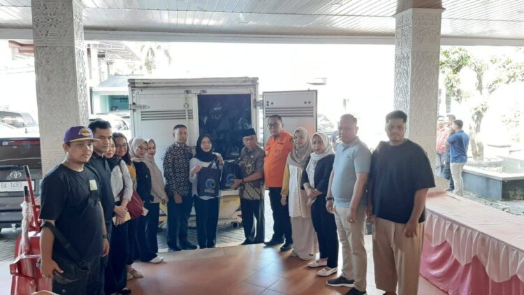 KemenHAM berikan bantuan sekaligus melakukan penguatan psikososial trauma healing, Kamis (18/12). IST