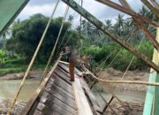 Kodim 0306/50 Kota Bangun Jembatan Gantung di Sungai Rimbang